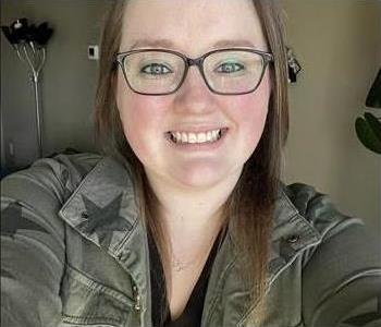 women is shown smiling