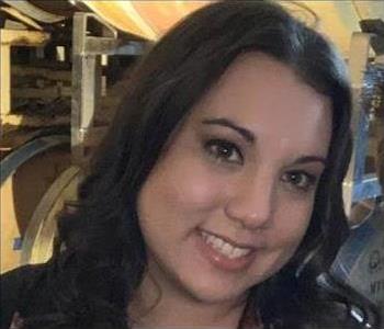 women is shown smiling